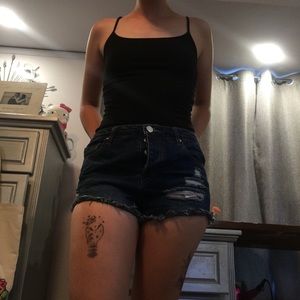 Distressed dark wash jean shorts